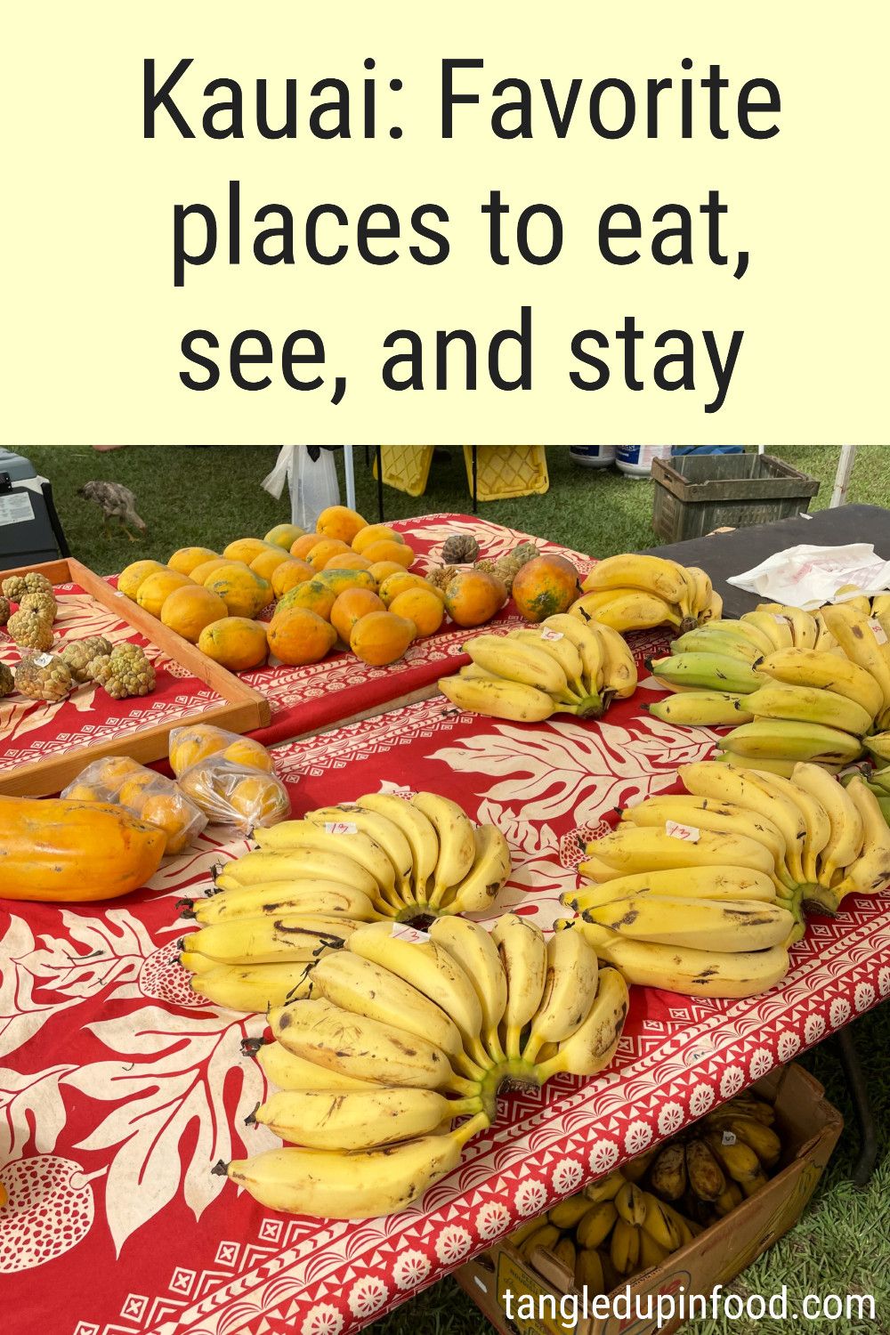 Photo of table with a display of fresh fruit with text reading "Kauai: Favorite places to eat, see, and stay"