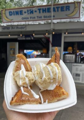 Bowl with pieces of cinnamon toast topped with ice cream