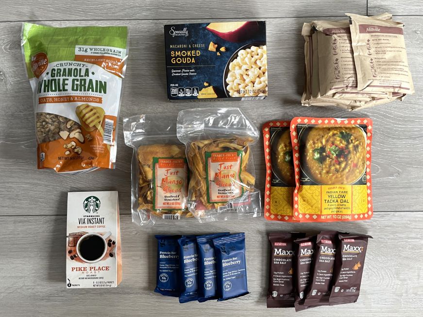 Groceries from home Packets of oatmeal, lentil dal, oatmeal, protein bars, and instant coffee