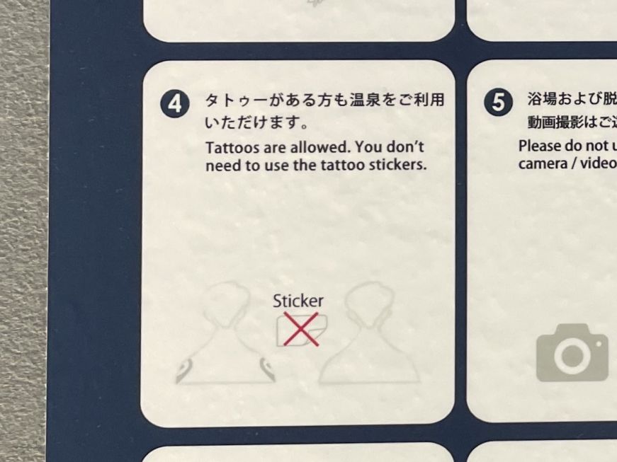 Sign indicating that tattoos are allowed