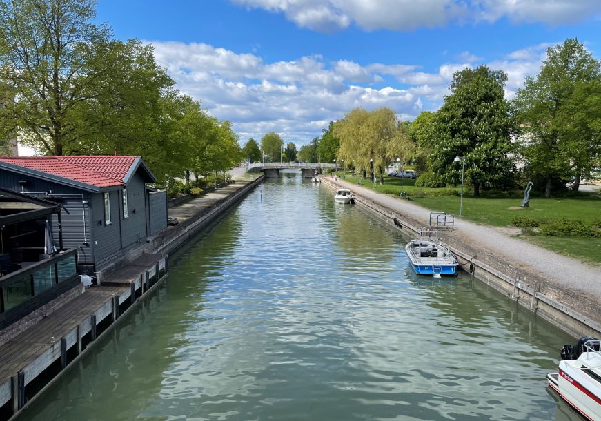 Canal with boats and restaurants along the edges