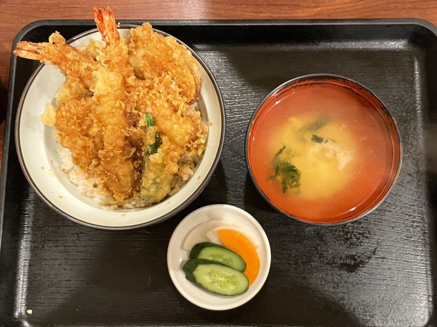 Tray with a bowl of rice and tempura, a bowl of miso soup, and a small dish of pickles