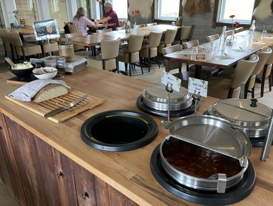 Soup buffet at Efstidalur II Small buffet with pots of soup and a loaf of bread