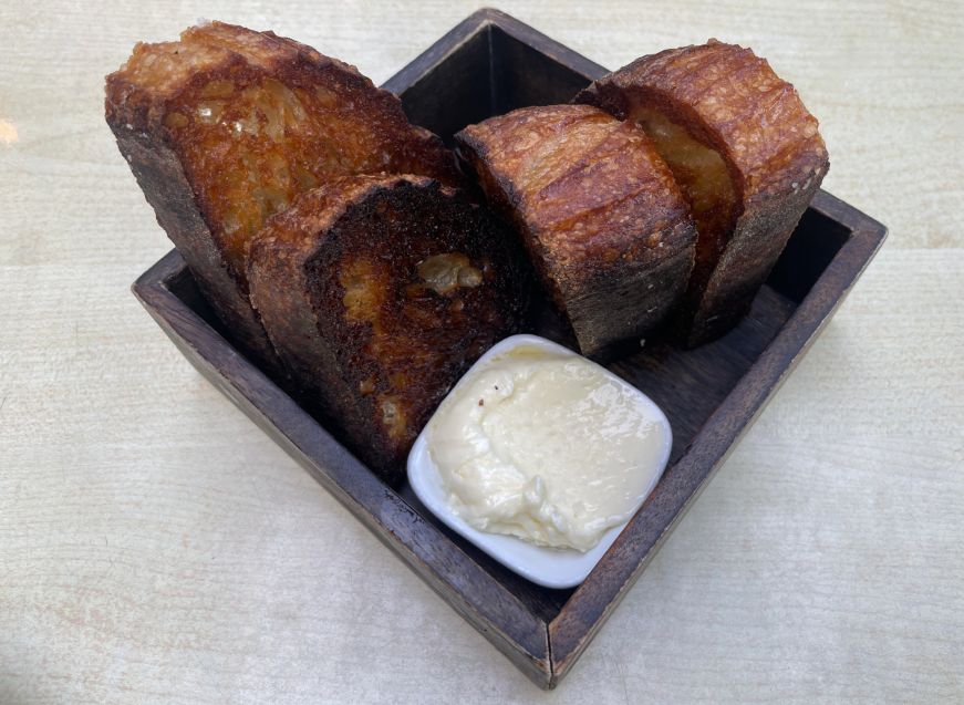 Sourdough, The Ostrich Club Rectangular dish with slices of toasted sourdough