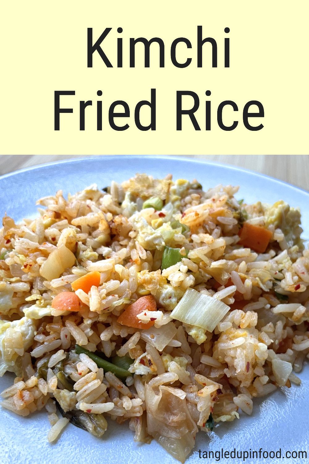 Close up photo of kimchi fried rice with text reading "Kimchi Fried Rice"