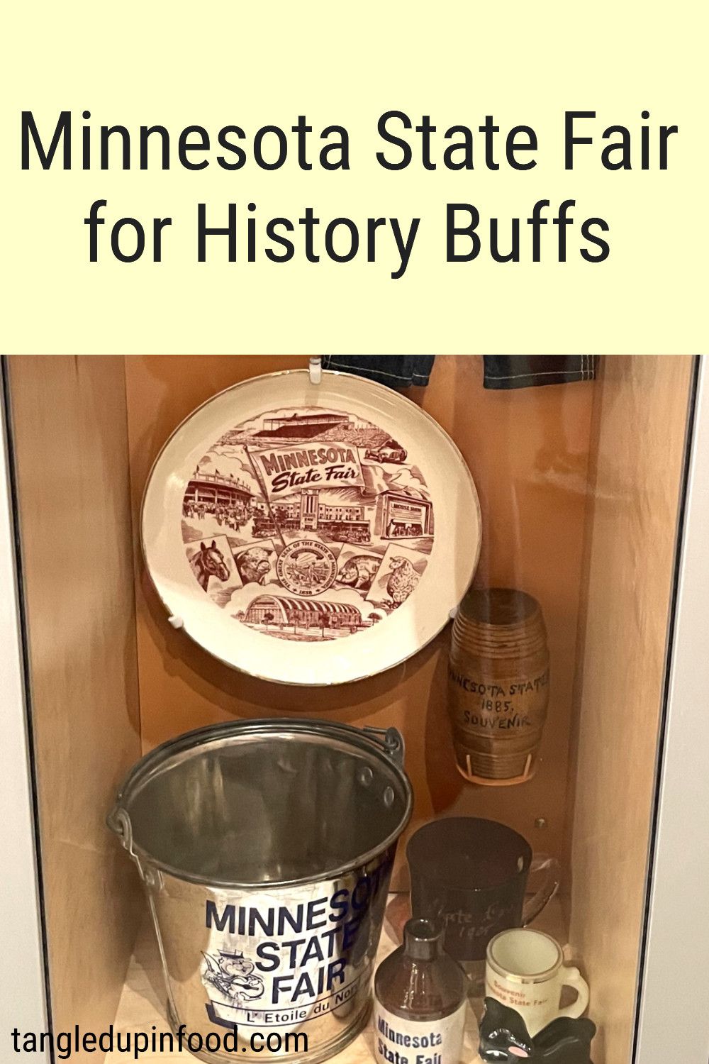 Photo of exhibit of vintage state fair souvenirs with text reading "Minnesota State Fair for History Buffs"