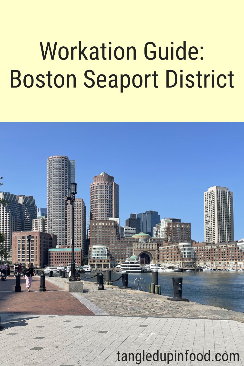 Workation Guide: Boston Seaport District Pinterest image Photo of Boston skyline with text reading "Workation Guide: Boston Seaport District"