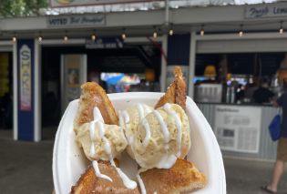 Bowl with pieces of cinnamon toast topped with ice cream